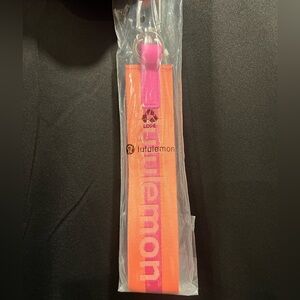 Lululemon Pink and Orange/salmon Keychain